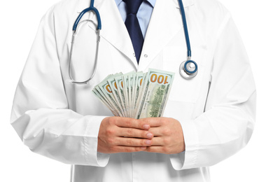 Photo of Doctor with bribe on white background, closeup. Corruption in medicine