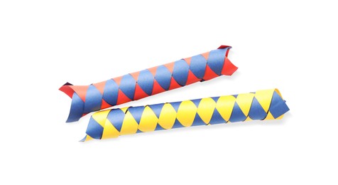Photo of Chinese finger traps on white background, top view