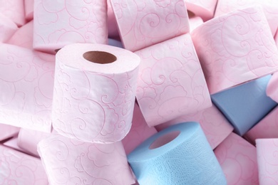 Photo of Many rolls of toilet paper as background. Personal hygiene