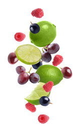 Image of Set of different fresh fruits and berries falling on white background