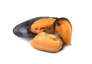 Delicious cooked mussels and shell on white background