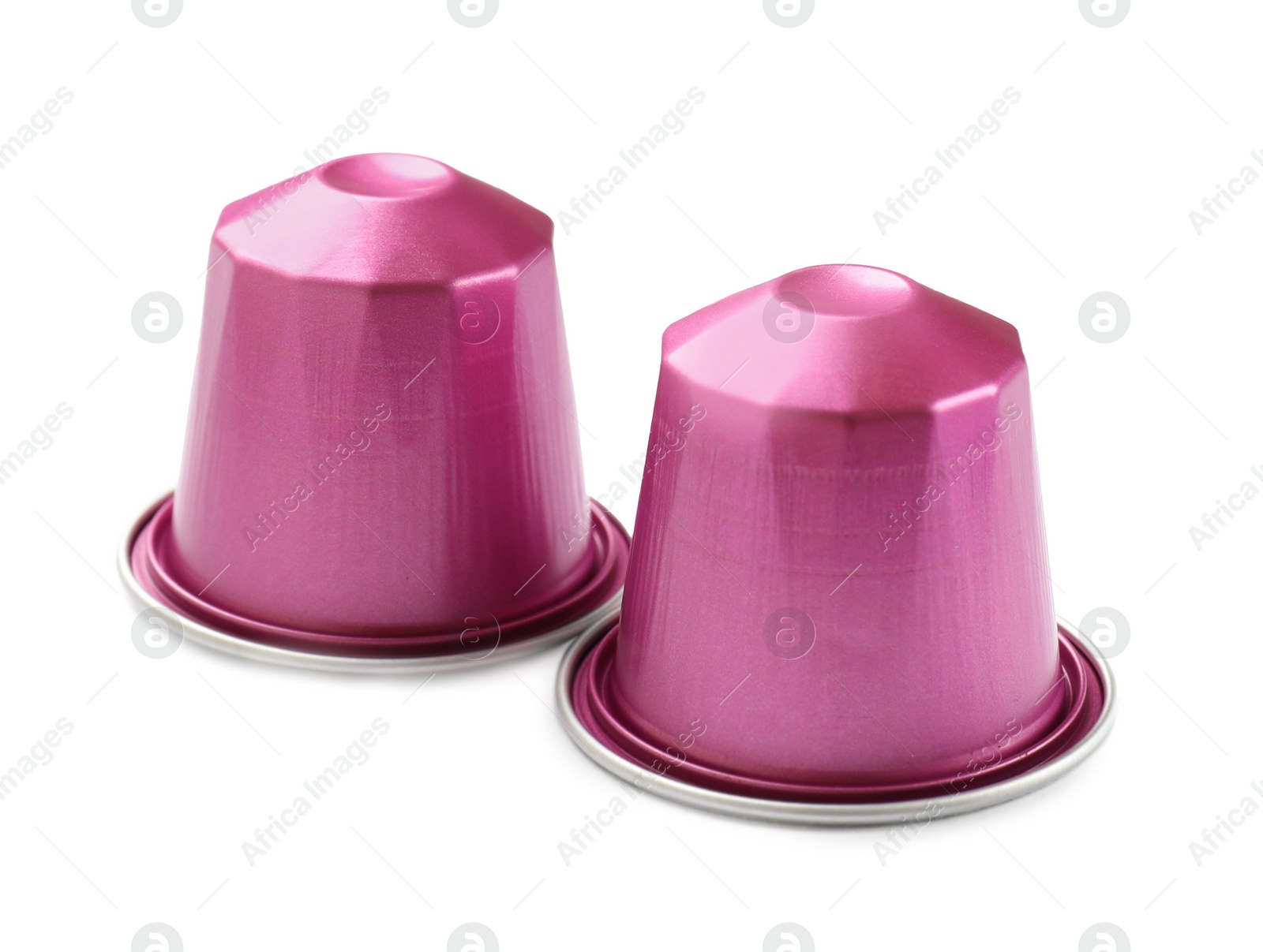 Photo of Two plastic coffee capsules isolated on white