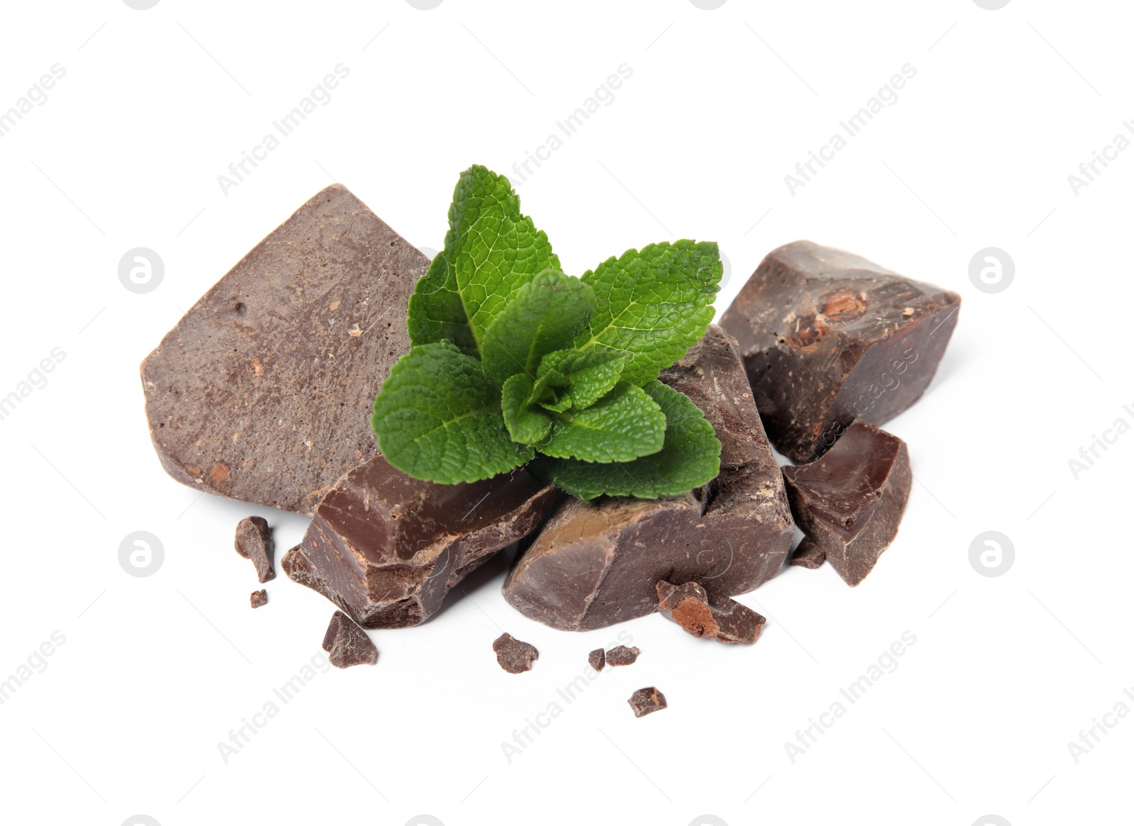 Photo of Tasty dark chocolate pieces with mint on white background