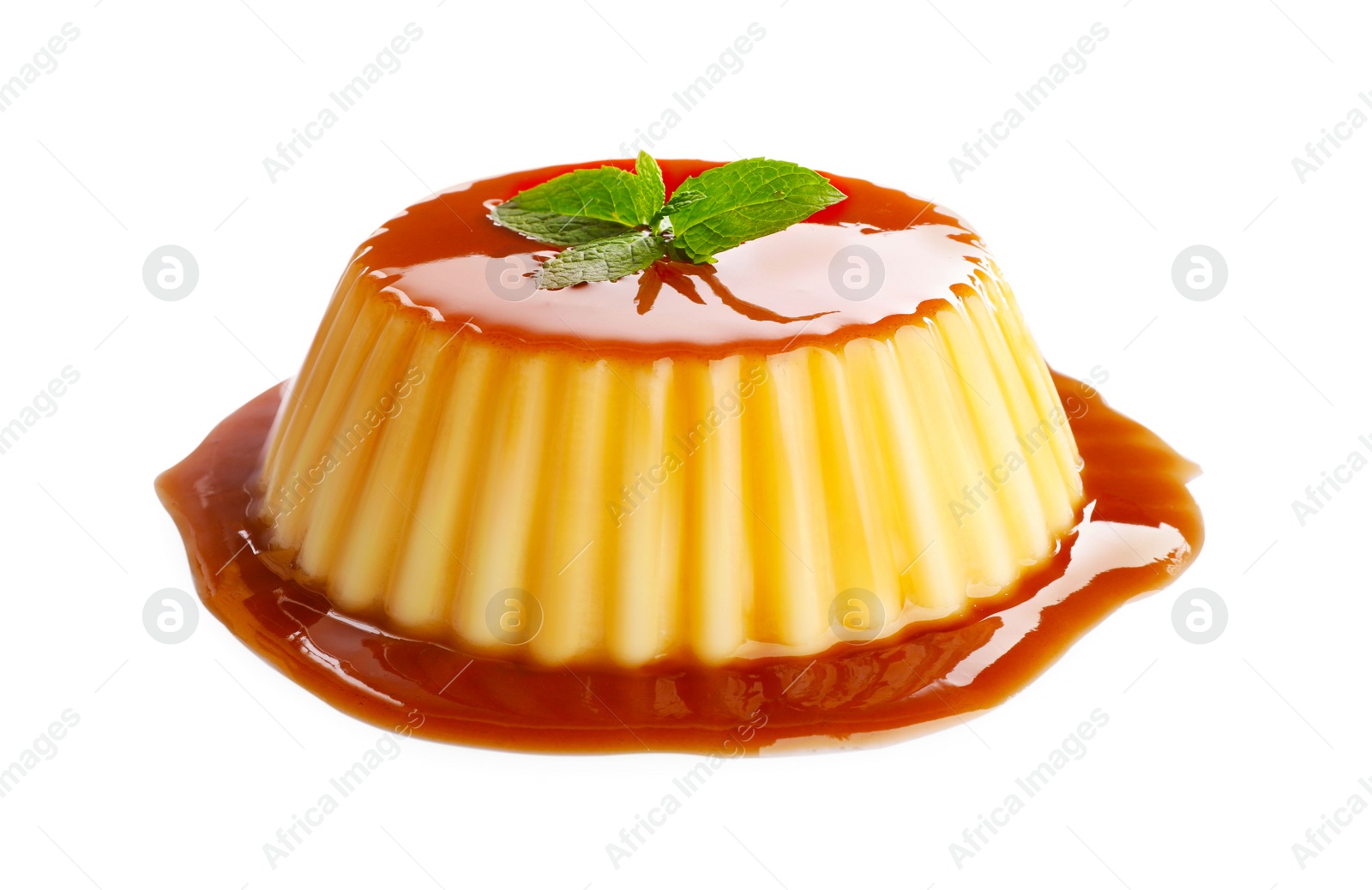 Photo of Delicious pudding with caramel and mint isolated on white