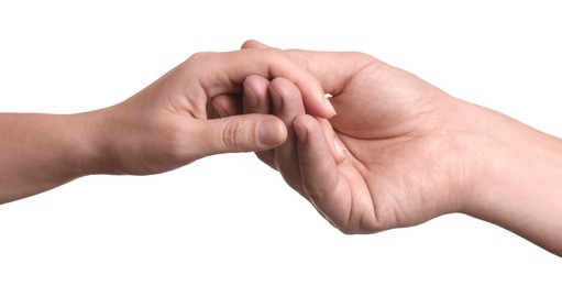 Man and woman holding hands together on white background, closeup