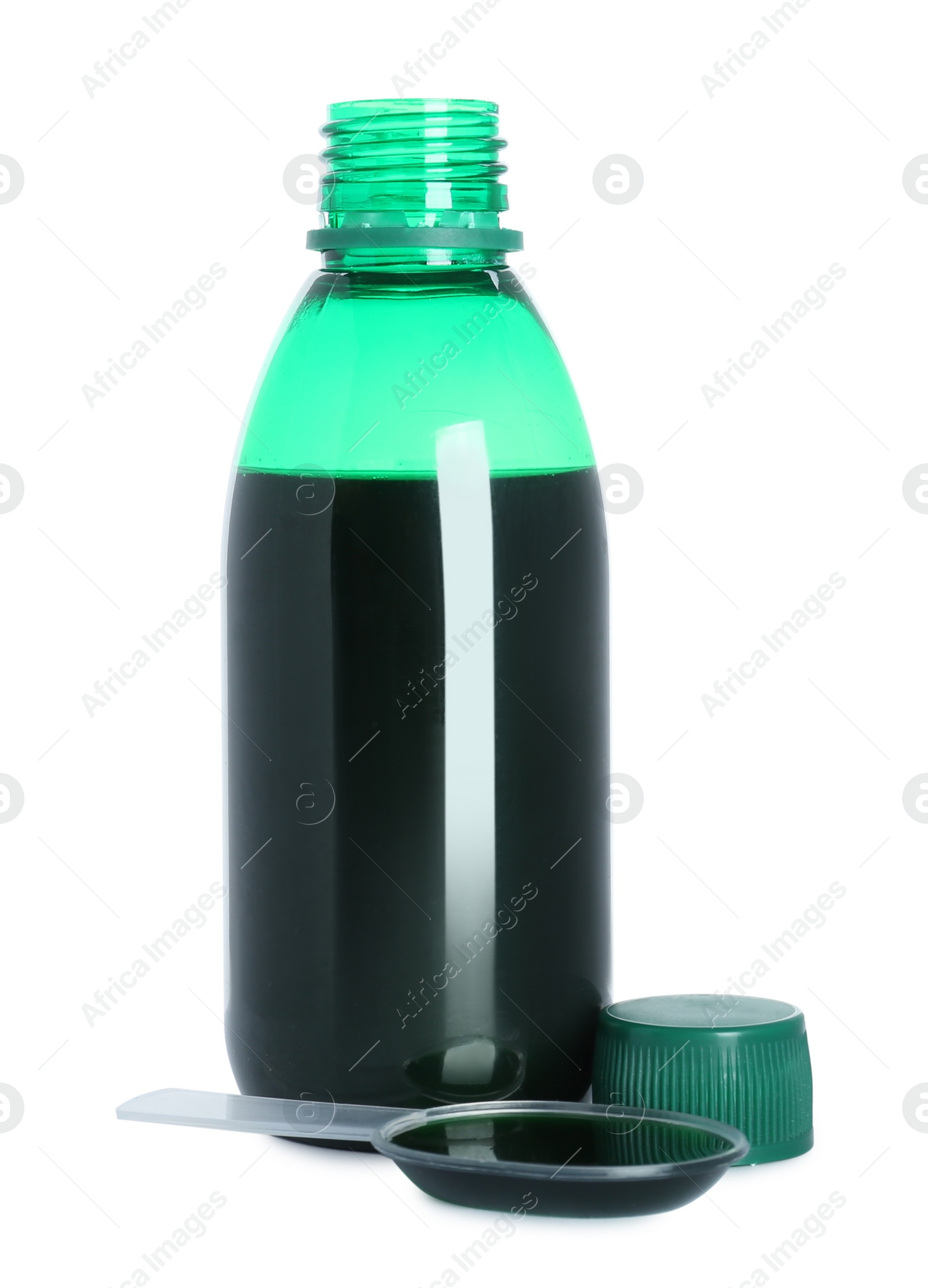 Photo of Bottle of cough syrup and dosing spoon on white background