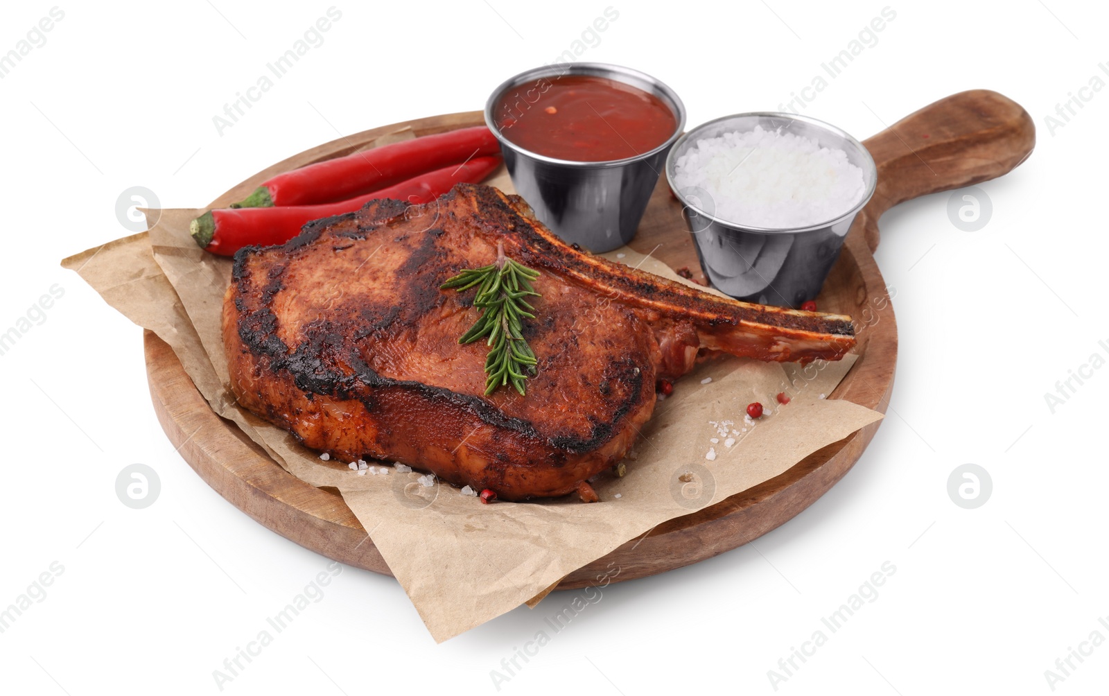 Photo of Board with tasty marinated meat, rosemary, chili and spices isolated on white