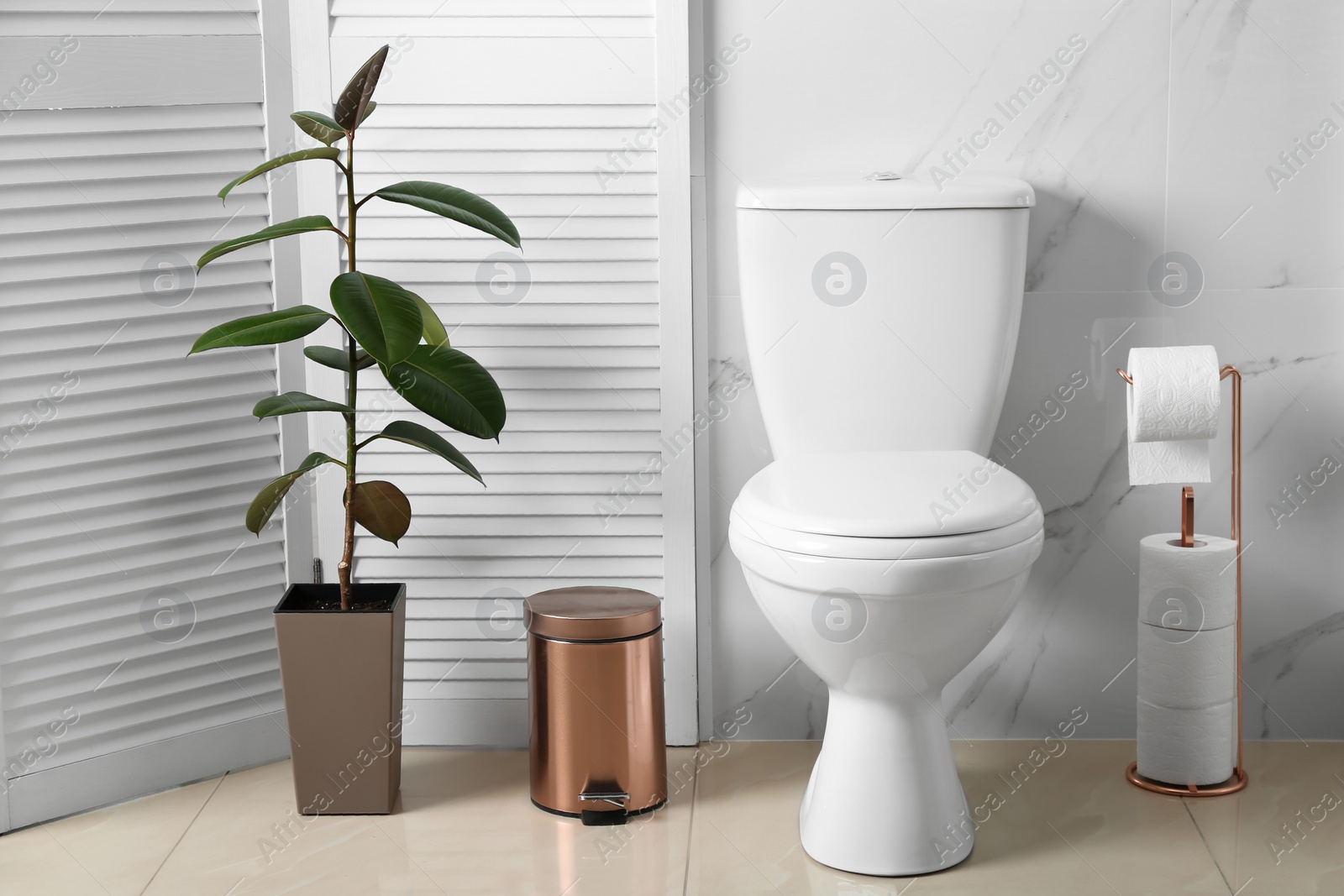 Photo of Ceramic toilet bowl in modern bathroom interior