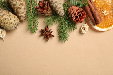 Photo of Flat lay composition with pinecones on beige background, space for text