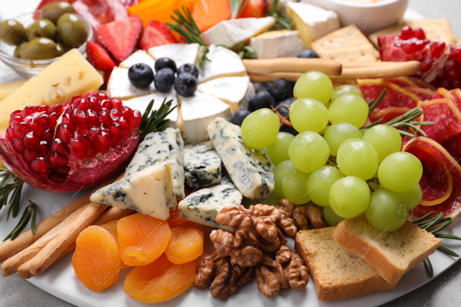 Photo of Assorted appetizers served on table, closeup view