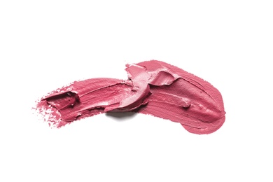 Photo of Pink lipstick smear on white background. Cosmetic product