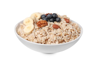 Photo of Tasty boiled oatmeal with blueberries, banana and nuts in bowl isolated on white