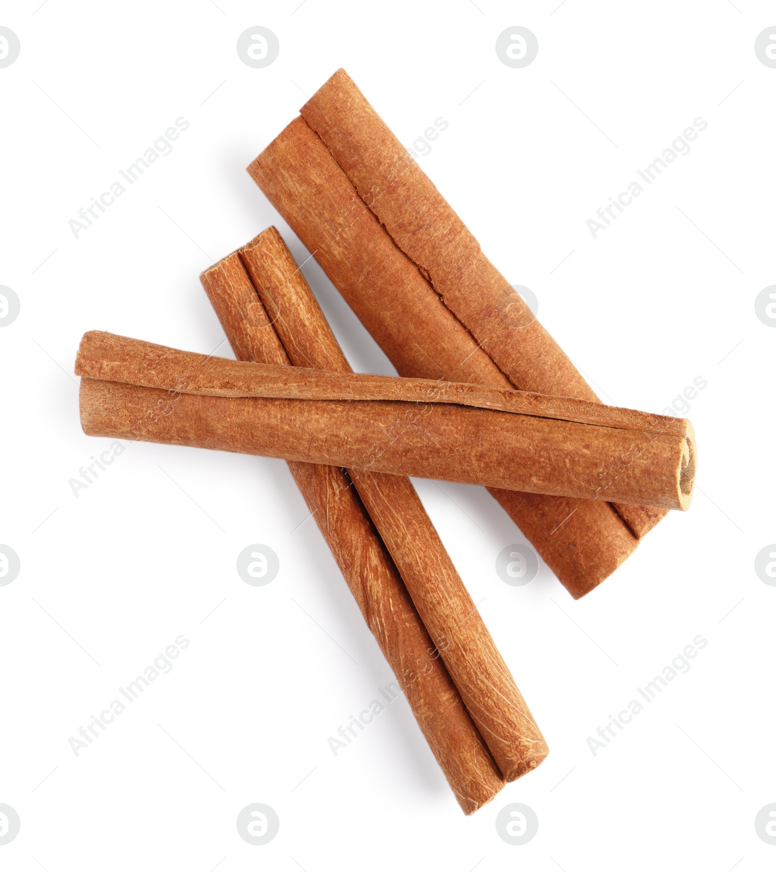 Photo of Cinnamon sticks isolated on white, top view