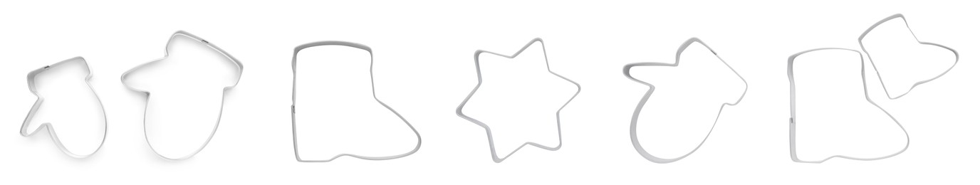 Image of Set with cookie cutters of different shapes on white background, top view. Banner design
