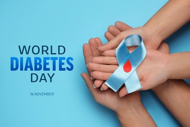 Image of World Diabetes Day. People holding light blue ribbon with paper blood drop on color background, top view
