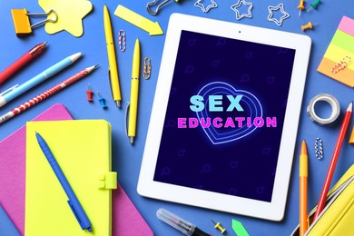 Image of Sex education. Modern tablet computer with open program on blue background, flat lay