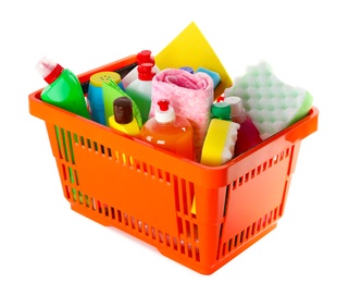 Photo of Shopping basket full of detergents on white background