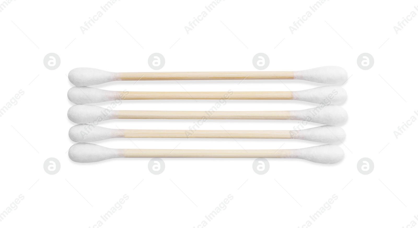 Photo of Wooden cotton buds on white background, top view