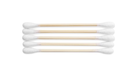 Photo of Wooden cotton buds on white background, top view