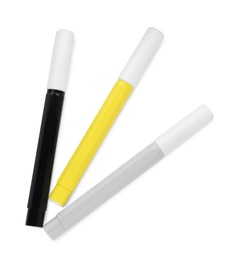 Different colorful markers on white background, top view