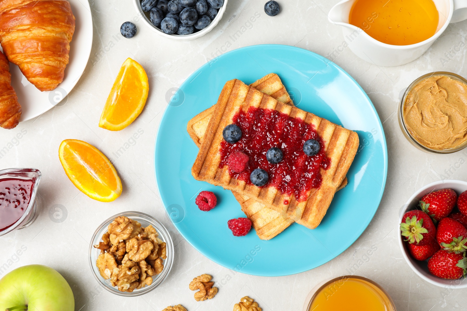 Photo of Flat lay composition with tasty breakfast on light grey marble table