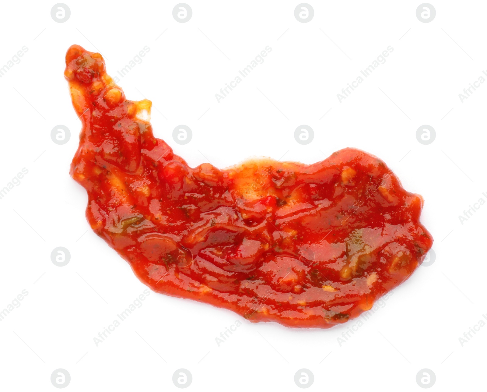 Photo of Smear of delicious adjika sauce isolated on white, top view