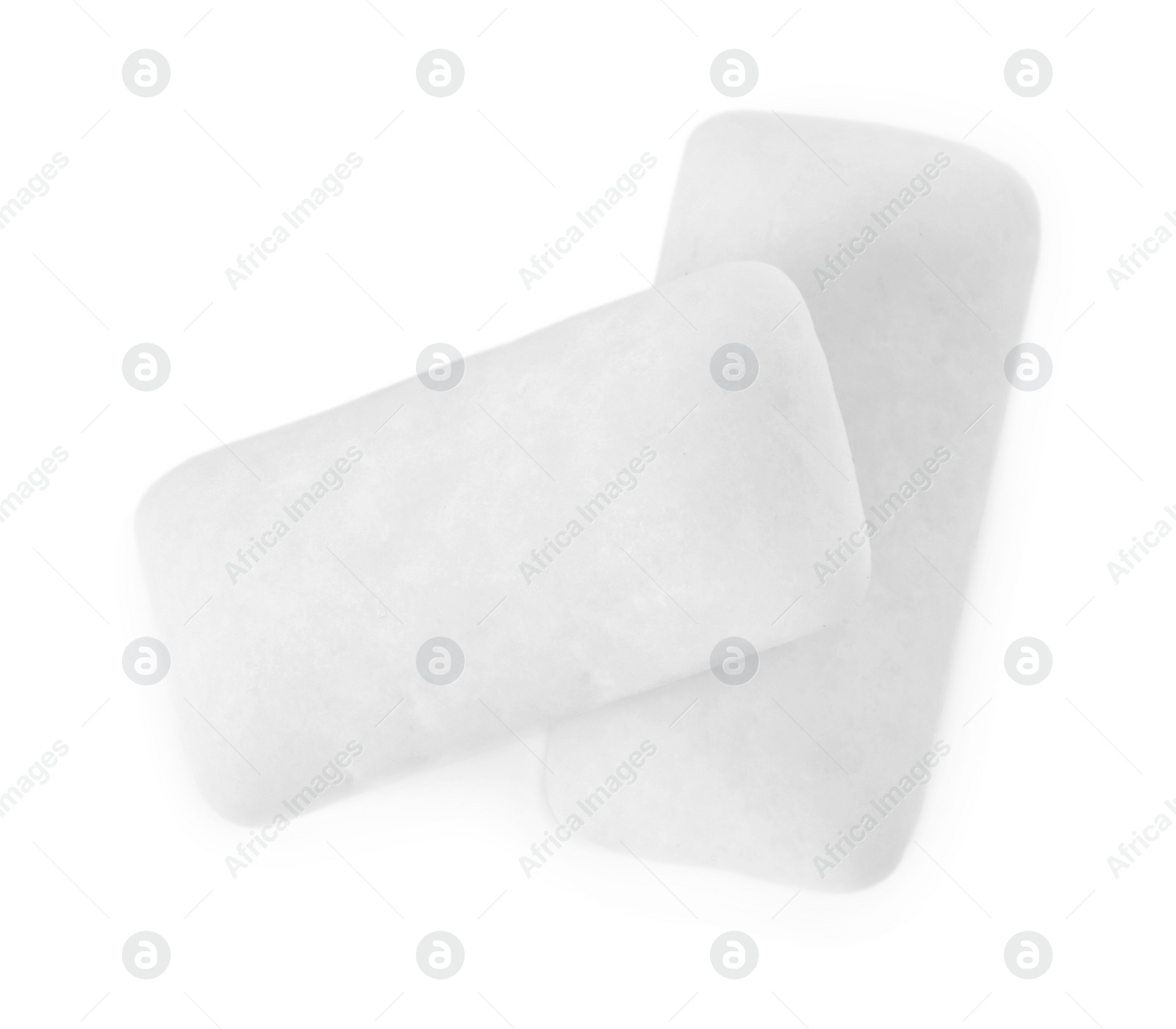 Photo of Tasty chewing gums on white background, top view