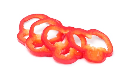 Slices of red bell pepper on white background