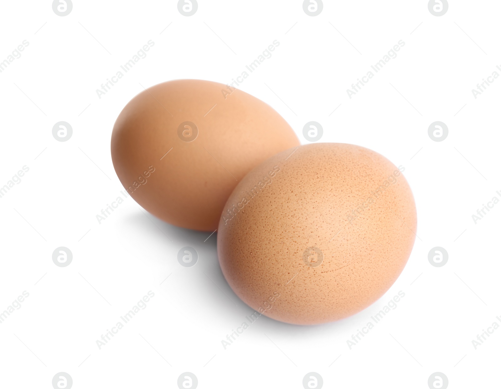 Photo of Fresh brown chicken eggs isolated on white