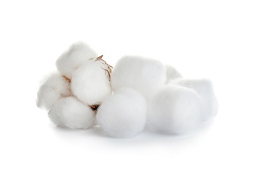 Photo of Balls of fluffy cotton and flower on white background