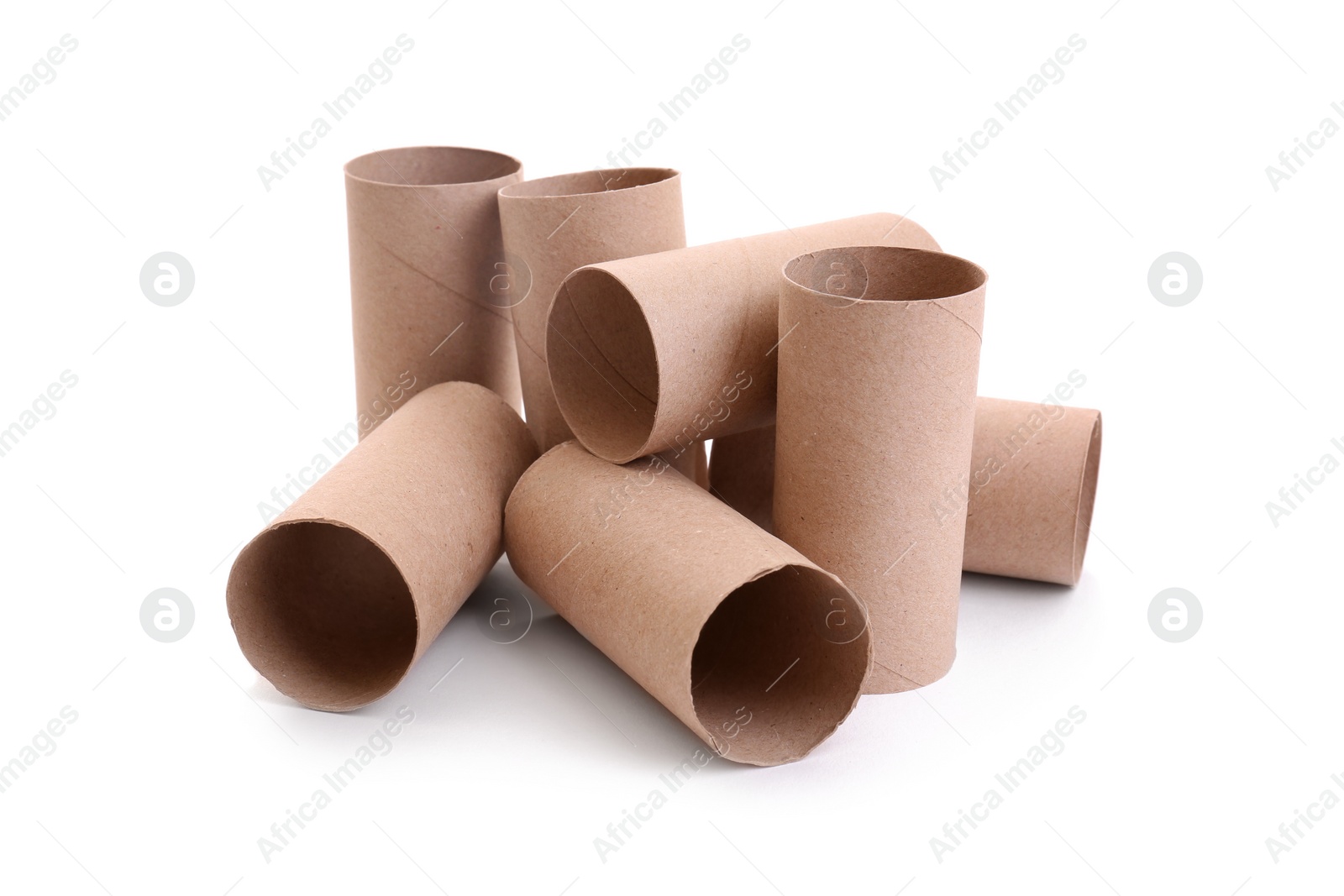 Photo of Empty paper toilet rolls on white background