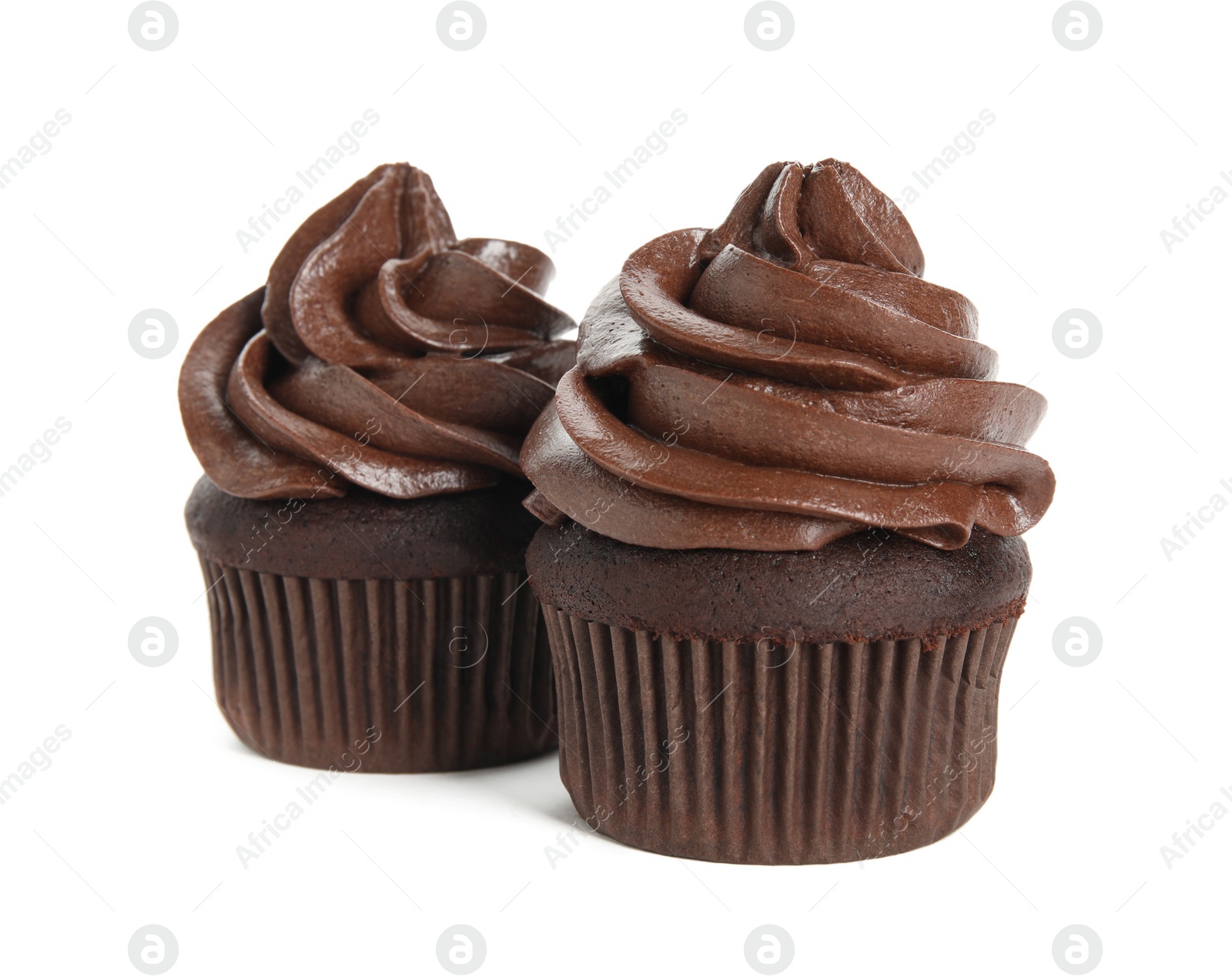 Photo of Delicious chocolate cupcakes with cream on white background