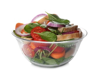 Delicious salad with chicken, vegetables and spinach in glass bowl isolated on white