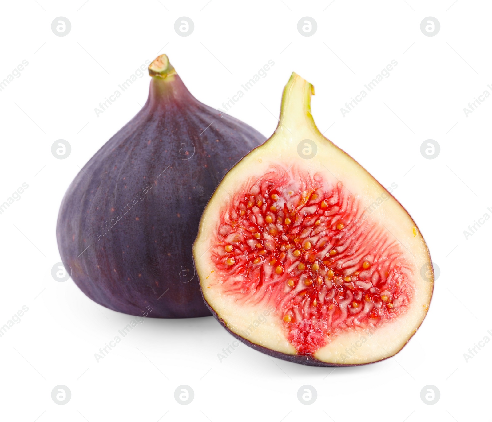 Photo of Whole and cut ripe figs isolated on white