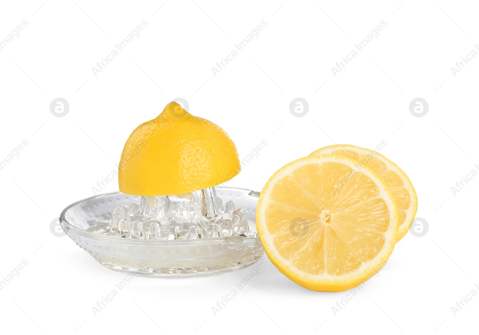 Photo of Plastic juicer and fresh lemons on white background