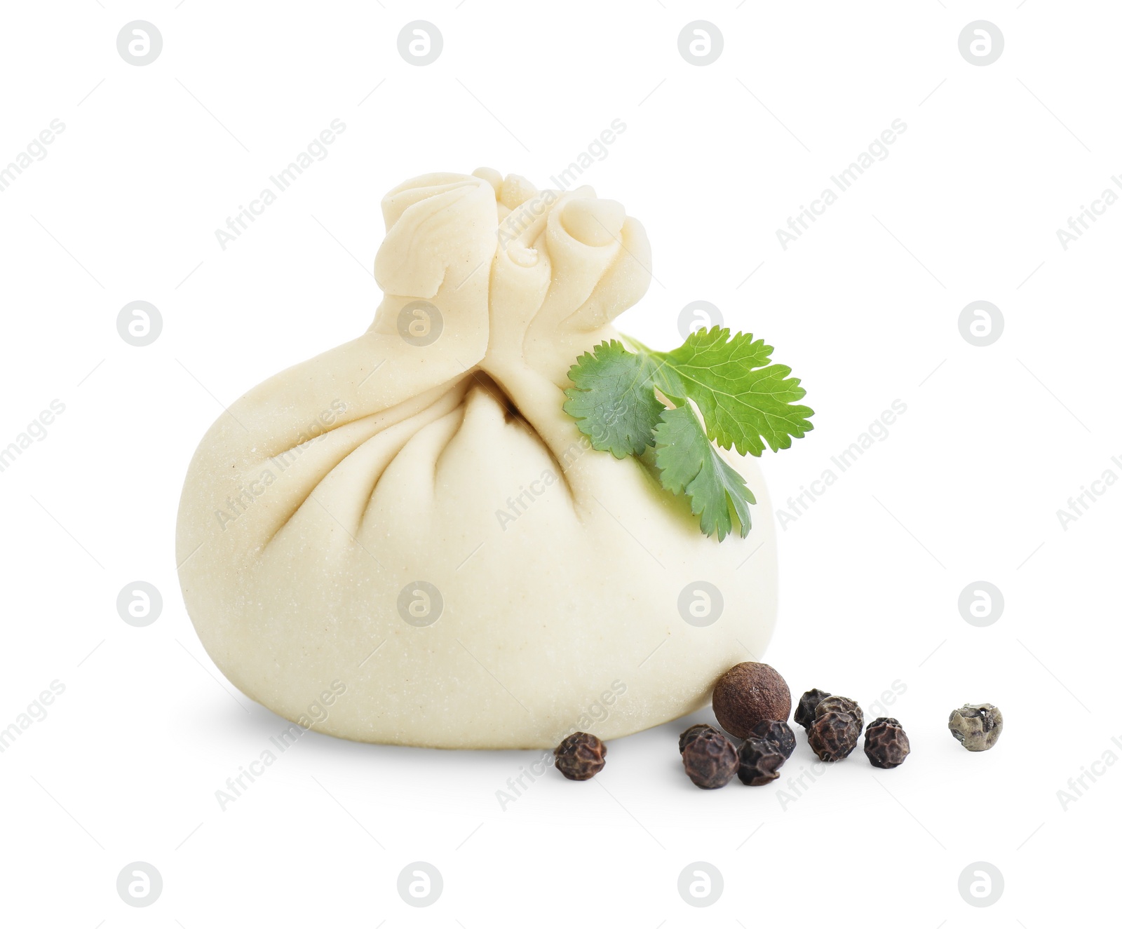 Photo of Uncooked khinkali (dumpling) and spices isolated on white. Georgian cuisine