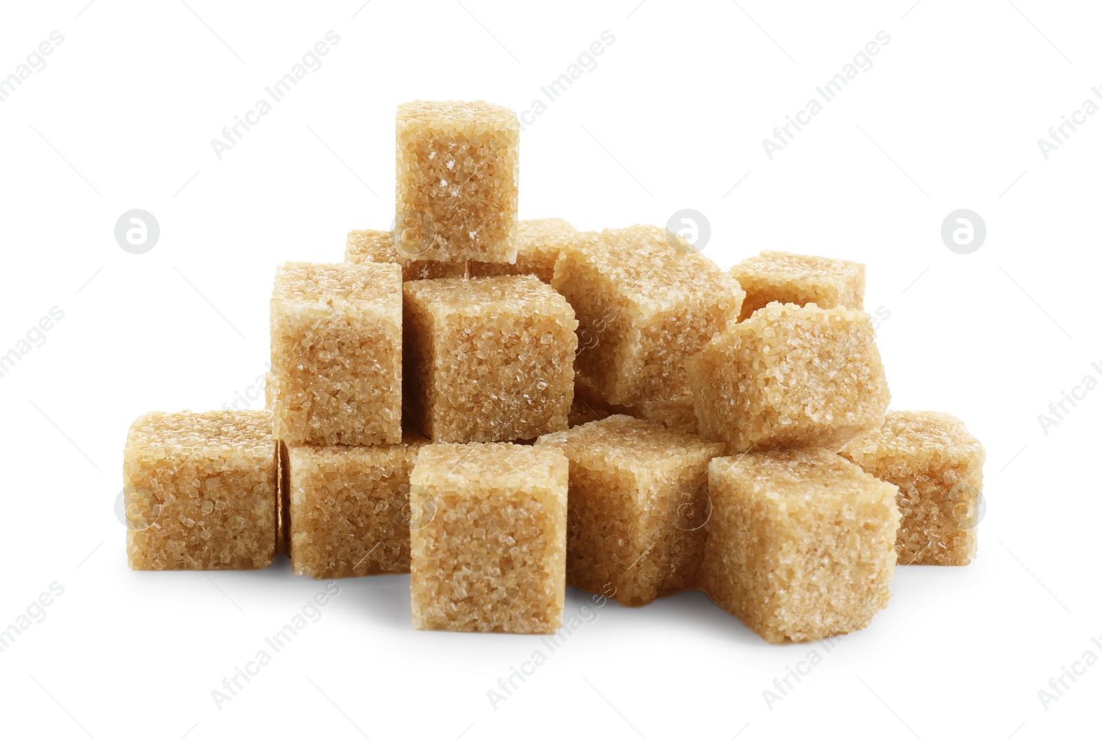 Photo of Many brown sugar cubes isolated on white