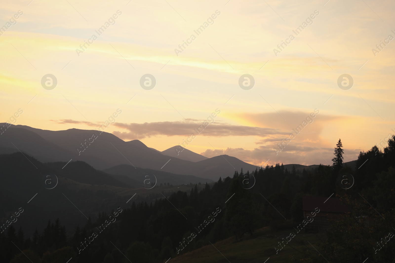 Photo of Picturesque view of mountains under beautiful sky in early morning
