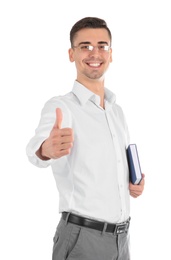 Photo of Young male teacher with book on white background