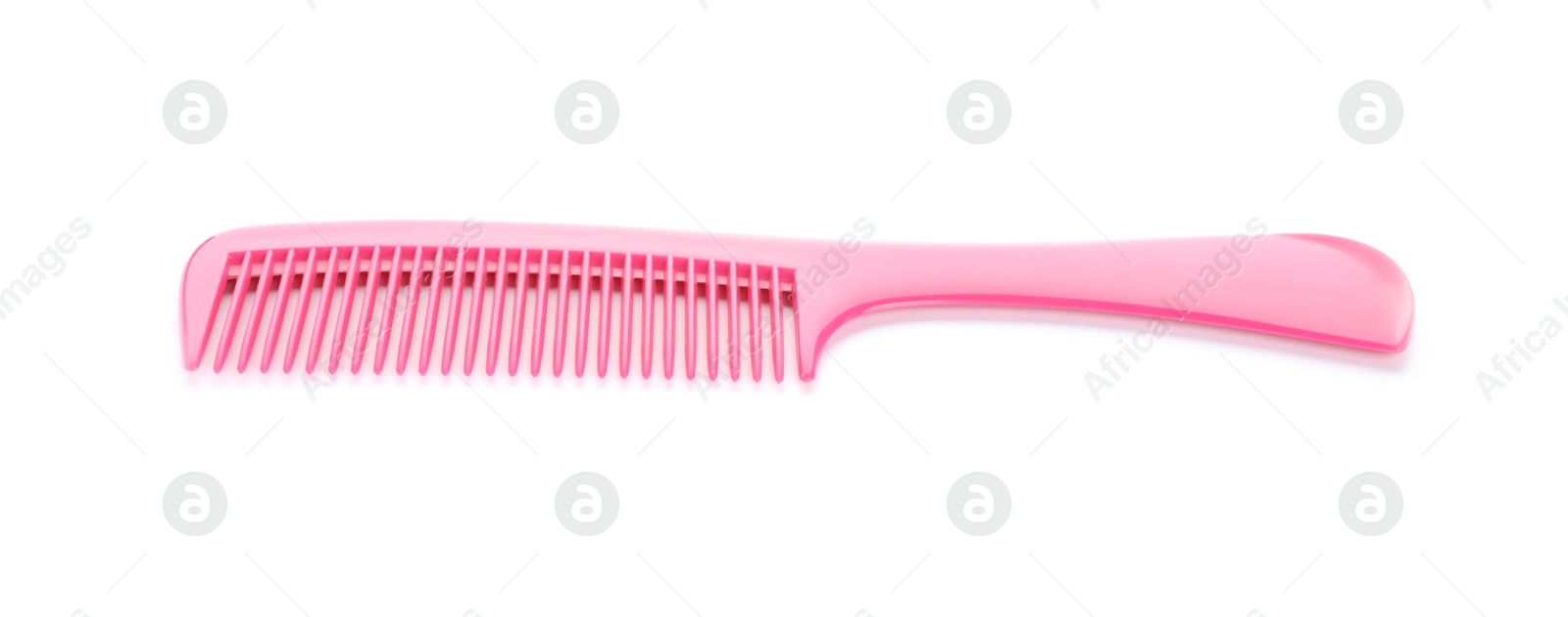 Photo of New pink hair comb isolated on white