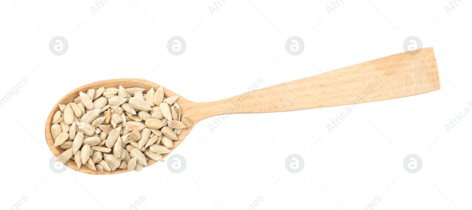 Photo of Peeled sunflower seeds in spoon on white background, top view