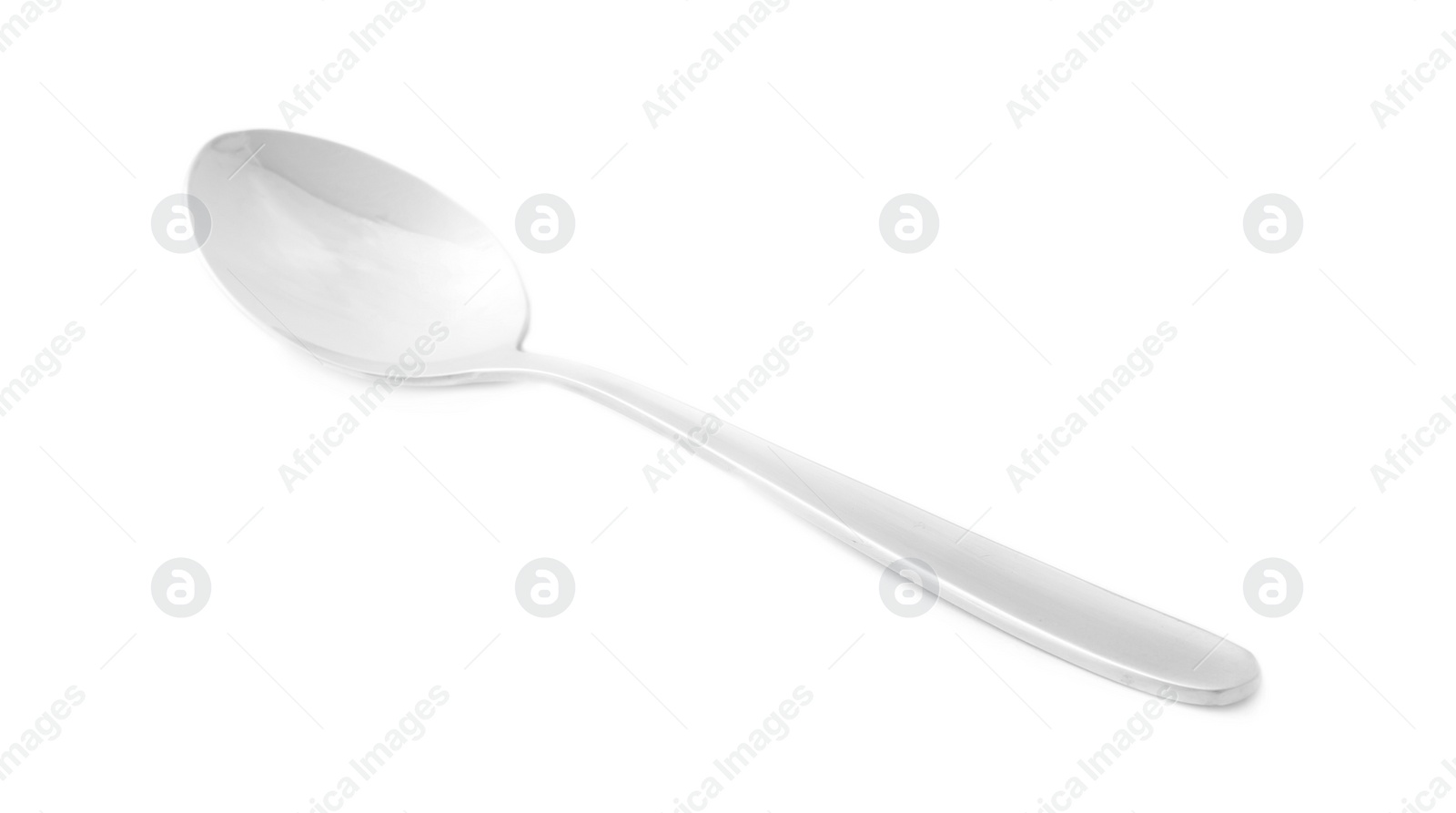 Photo of New clean shiny spoon isolated on white