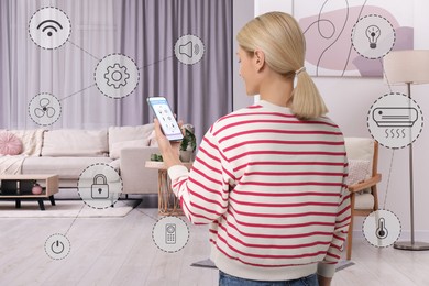 Woman using smart home control system via application on mobile phone indoors. Different icons around her