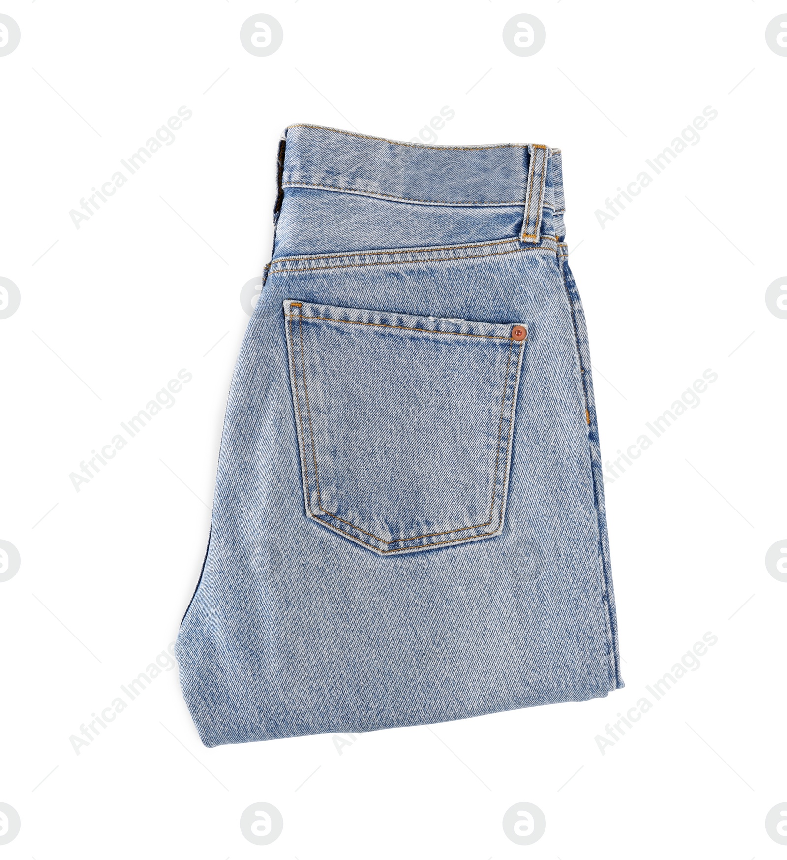 Photo of Light blue jeans isolated on white, top view. Stylish clothes