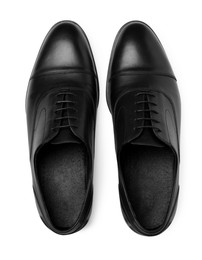 Photo of Pair of black leather men shoes on white background, top view