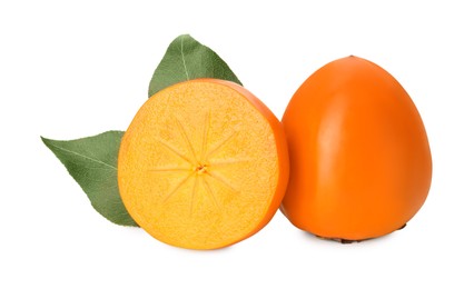 Photo of Whole and cut delicious ripe juicy persimmons on white background