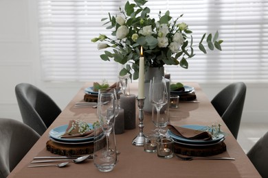 Festive table setting with beautiful tableware and decor indoors