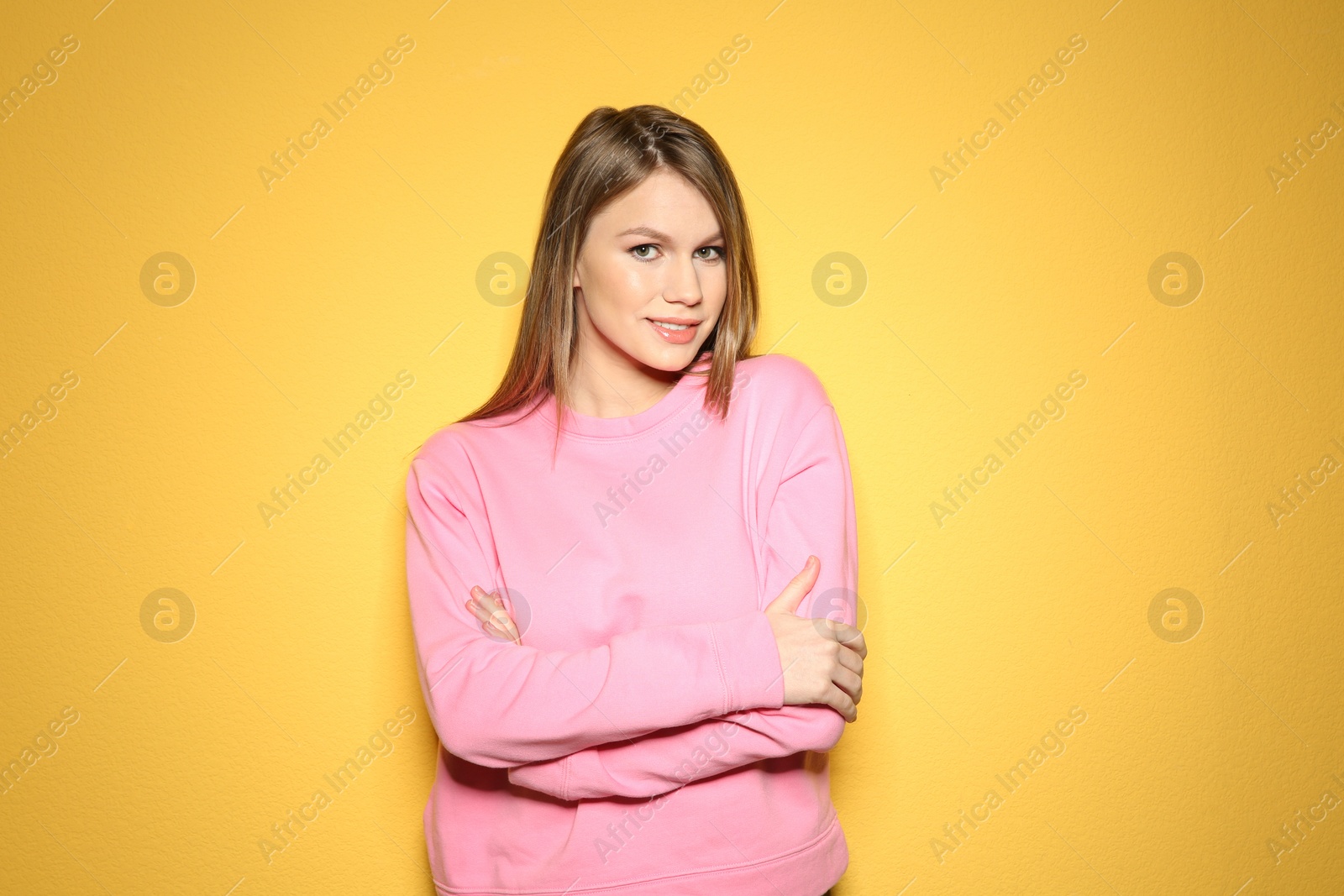 Photo of Portrait of beautiful young woman on color background