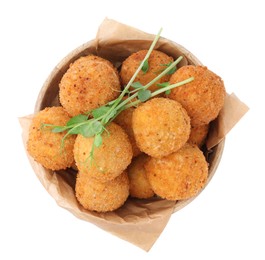 Bowl with delicious fried tofu balls and pea sprouts on white background, top view