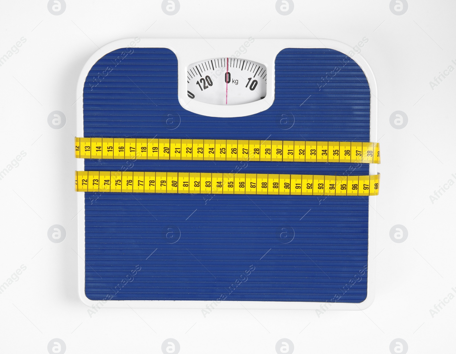 Photo of Modern scales and tape measure isolated on white, top view